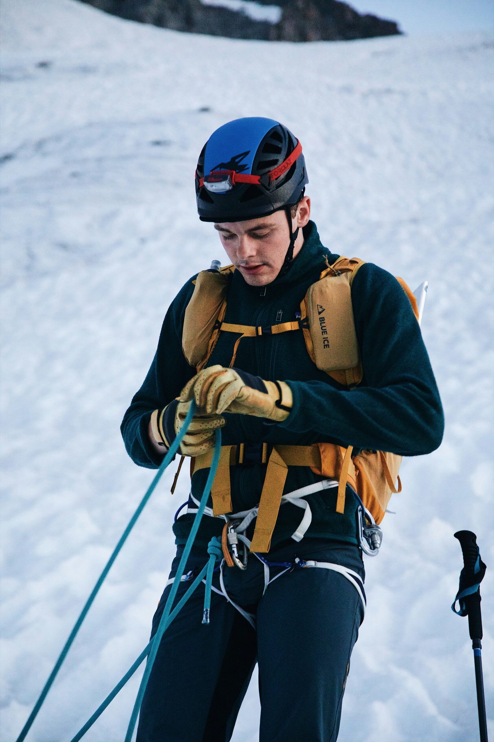 a person on skis standing in the snow